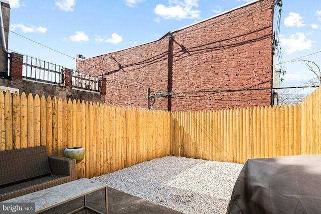 view of yard with a patio and a fenced backyard