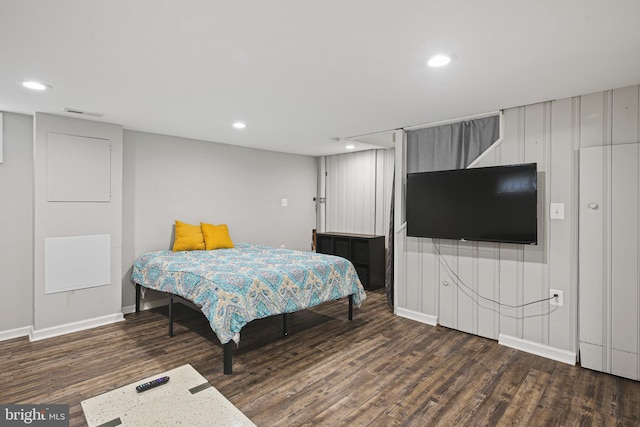 bedroom featuring recessed lighting, baseboards, and wood finished floors