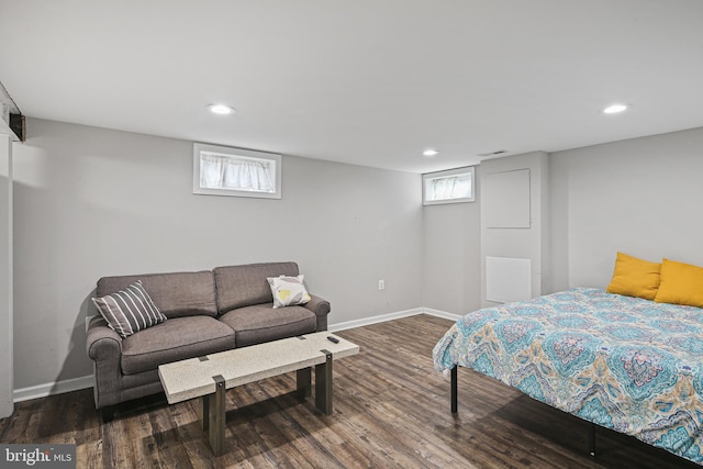 bedroom featuring recessed lighting, baseboards, and wood finished floors