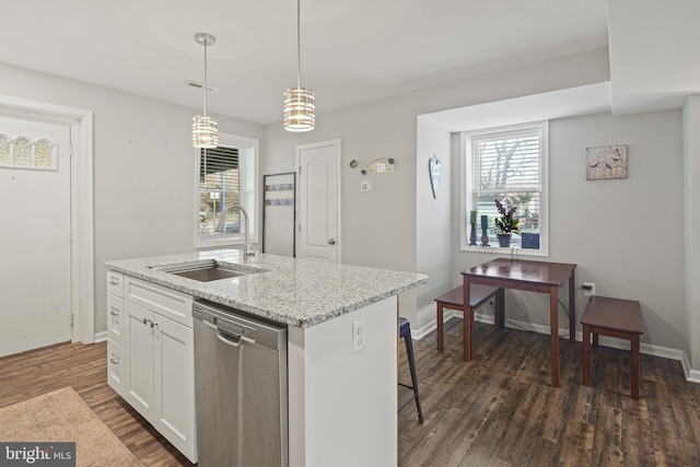 kitchen with dishwasher, a healthy amount of sunlight, dark wood-style floors, and a sink