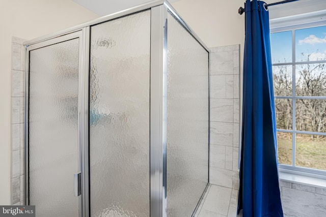 full bath featuring a stall shower