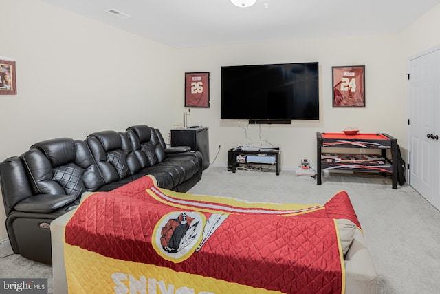 living area featuring carpet floors, baseboards, and visible vents