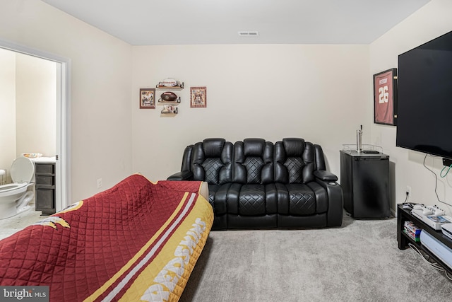 carpeted living room with visible vents