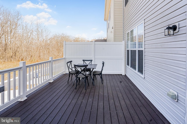 deck with outdoor dining space