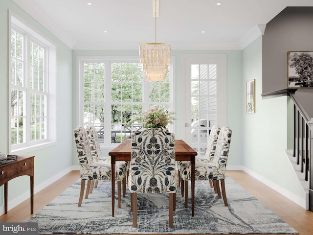 dining room featuring ornamental molding, recessed lighting, and baseboards