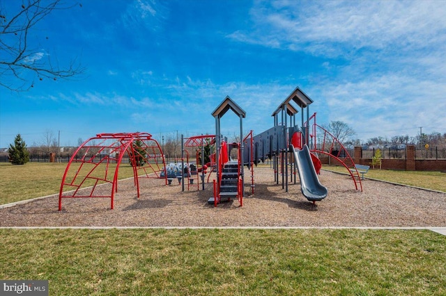 community jungle gym with a yard