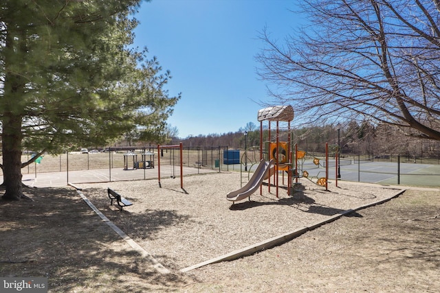 community jungle gym with fence