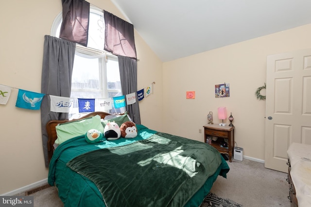 carpeted bedroom with lofted ceiling, visible vents, and baseboards