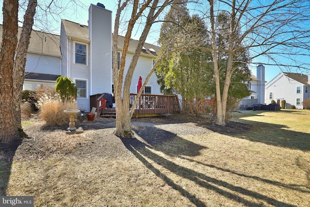 exterior space featuring a wooden deck