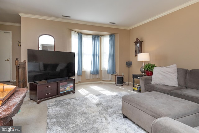 living area featuring visible vents, crown molding, light carpet, and baseboards