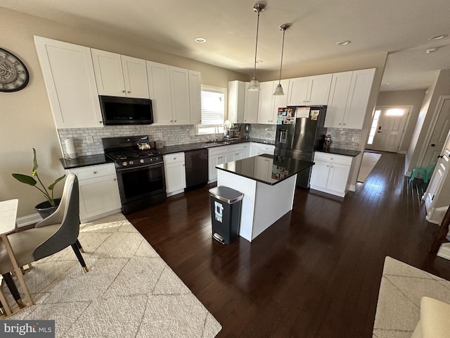 kitchen with range with gas cooktop, white cabinets, fridge with ice dispenser, a sink, and dishwasher