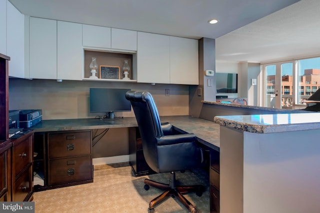 office space featuring built in desk and recessed lighting