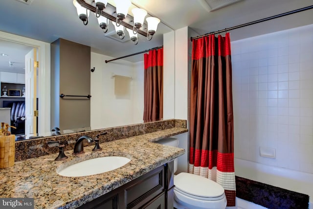 full bathroom featuring toilet, visible vents, shower / bath combination with curtain, and vanity