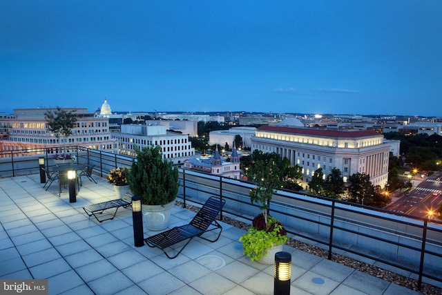 exterior space featuring a balcony and a city view