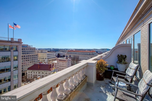 balcony featuring a view of city