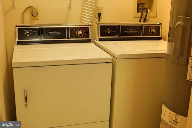 laundry room featuring laundry area and separate washer and dryer