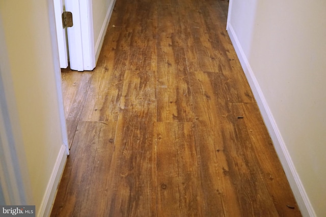 room details featuring wood finished floors and baseboards