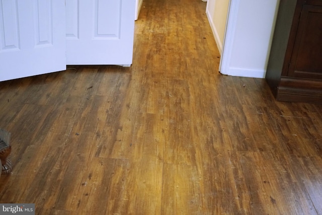 room details featuring wood finished floors and baseboards