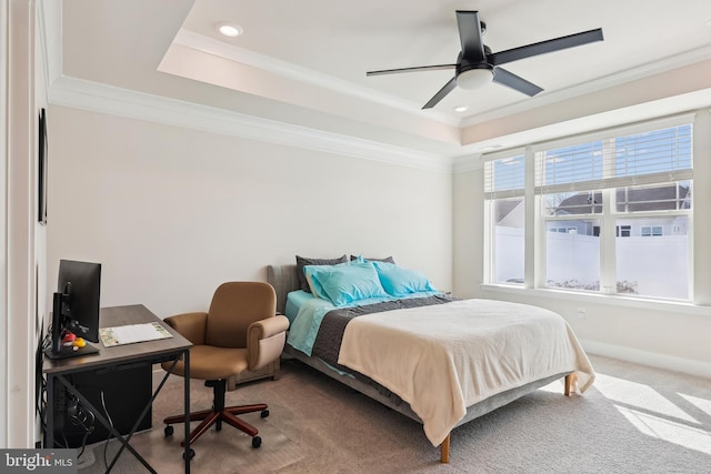 bedroom featuring carpet, baseboards, a tray ceiling, recessed lighting, and ornamental molding