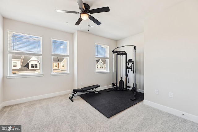 workout room with a ceiling fan, baseboards, visible vents, and carpet floors