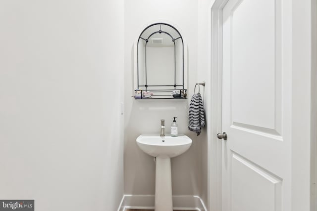 bathroom with baseboards