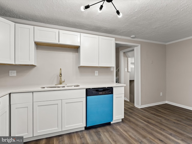 kitchen with dark wood-style flooring, light countertops, a sink, and dishwashing machine