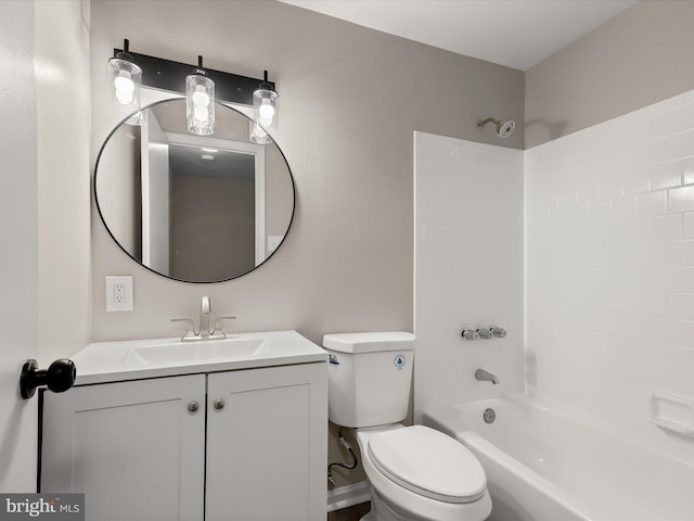 full bathroom featuring toilet, vanity, and bathing tub / shower combination