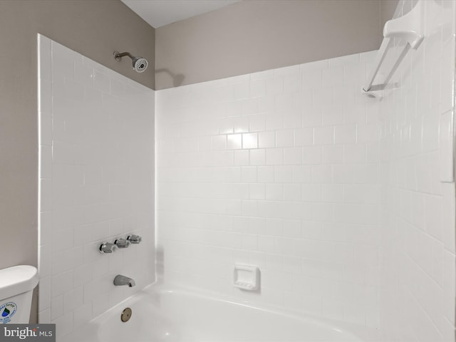 bathroom with toilet and shower / bathtub combination