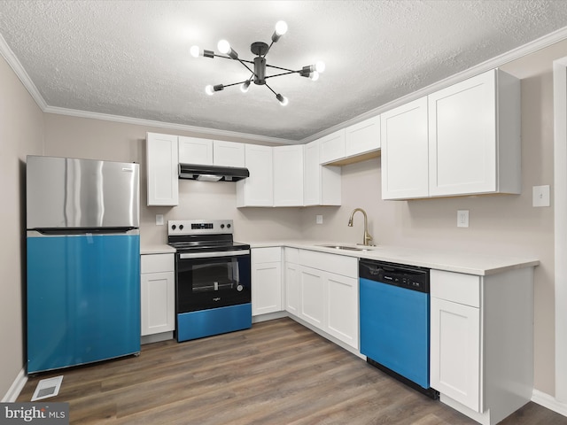 kitchen featuring electric range, freestanding refrigerator, a sink, dishwasher, and under cabinet range hood