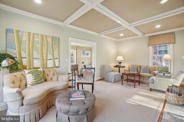 living room with beam ceiling, a healthy amount of sunlight, coffered ceiling, and light carpet