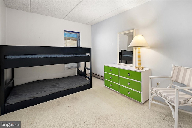 10000 Coastal Hwy Unit 1208, Ocean City, MD 21842 - bedroom with light carpet, a baseboard heating unit, and a paneled ceiling