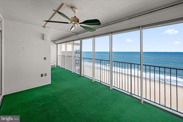 10000 Coastal Hwy Unit 1208, Ocean City, MD 21842 - unfurnished sunroom with a water view, a ceiling fan, and a view of the beach