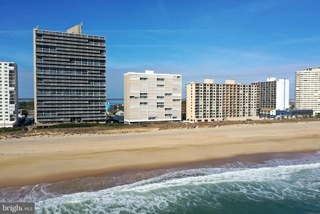 10000 Coastal Hwy Unit 1208, Ocean City, MD 21842 - view of building exterior featuring a view of city, a water view, and a view of the beach