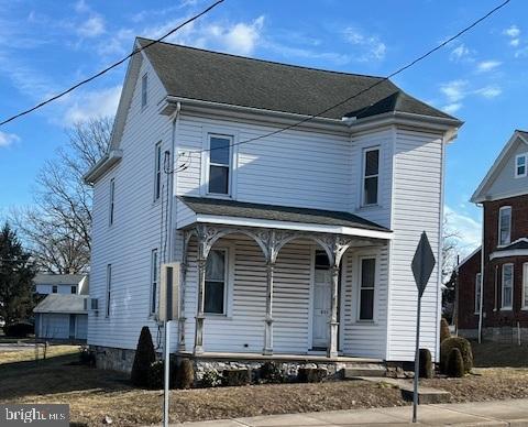 traditional-style home with a porch