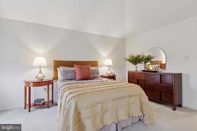 carpeted bedroom with baseboards