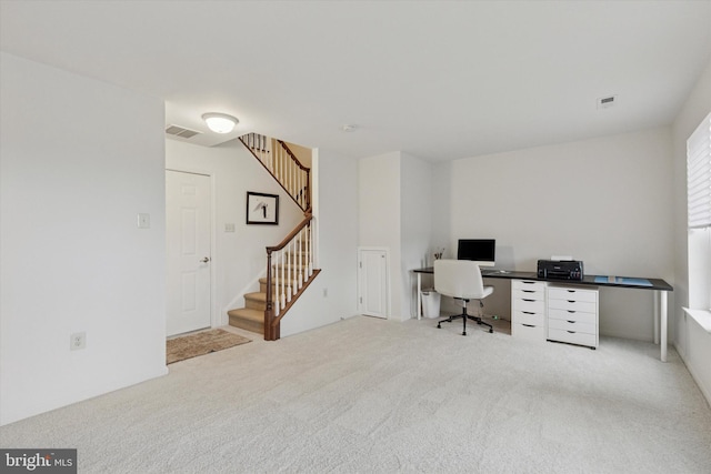 office area featuring carpet and visible vents