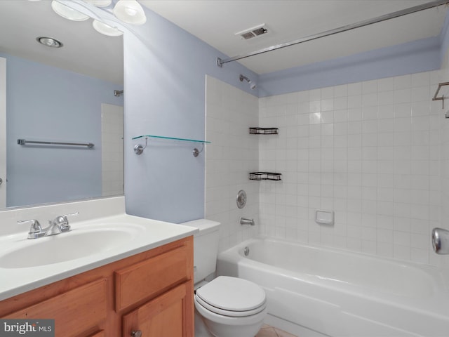 full bathroom featuring toilet, shower / bath combination, vanity, and visible vents