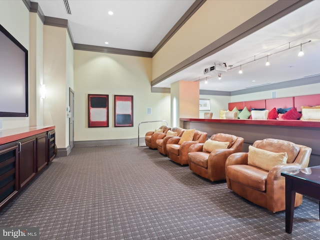 carpeted home theater featuring track lighting, recessed lighting, crown molding, and baseboards