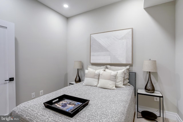 bedroom featuring recessed lighting and baseboards