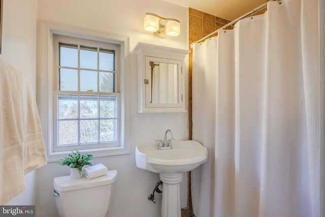 bathroom featuring toilet