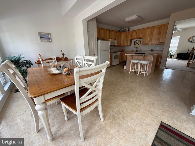 dining room featuring a ceiling fan