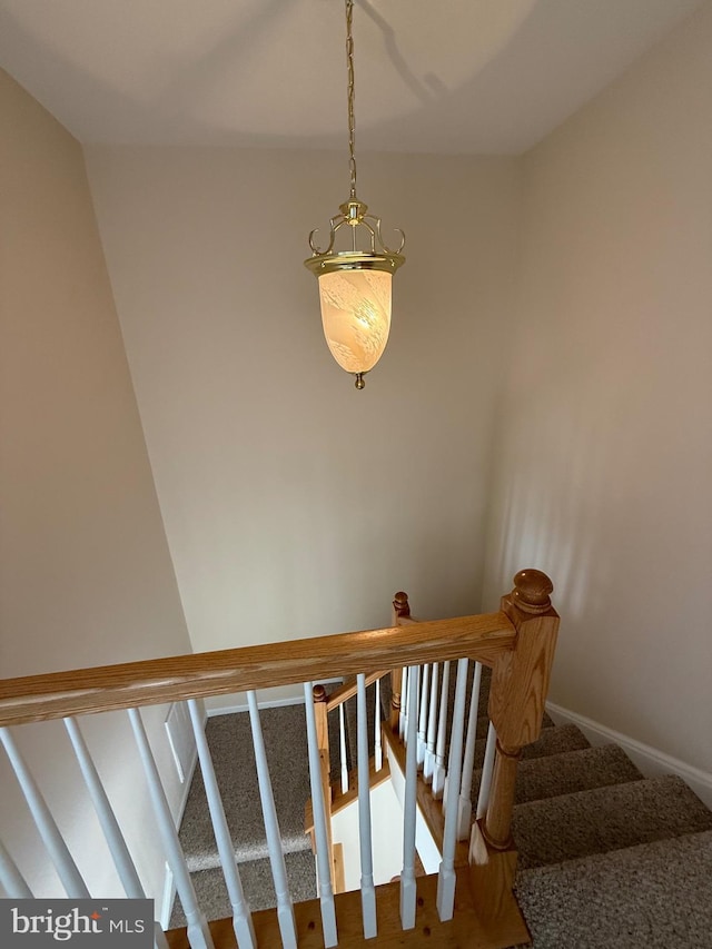 staircase with baseboards