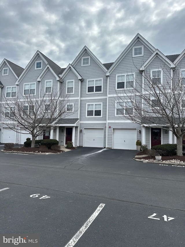 view of property featuring a garage