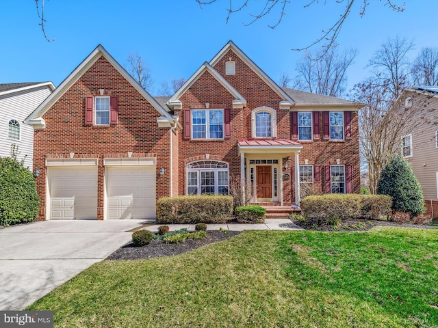 view of front of property featuring driveway, brick siding, and a front lawn