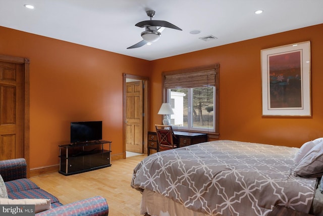 bedroom with recessed lighting, visible vents, a ceiling fan, wood finished floors, and baseboards