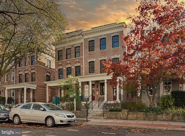 view of property at dusk