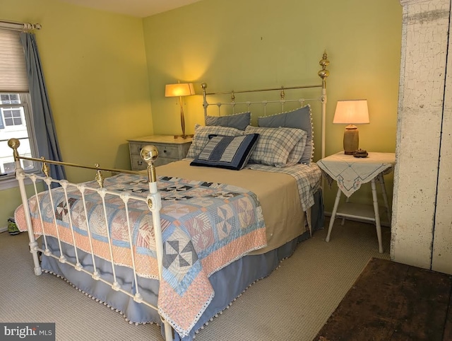 bedroom featuring carpet