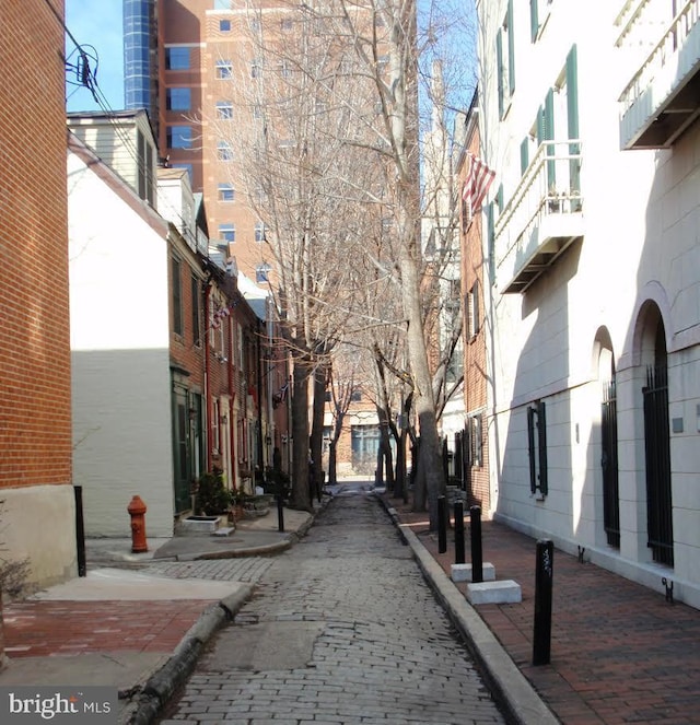 view of street featuring sidewalks and curbs