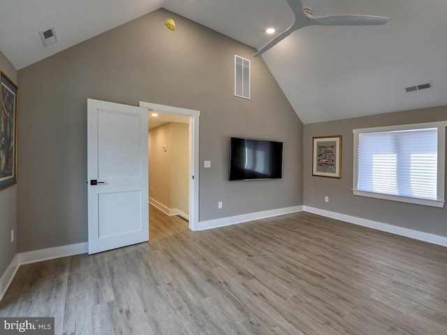 unfurnished living room with baseboards, visible vents, and a ceiling fan