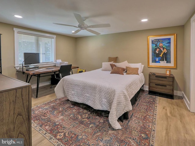 bedroom featuring baseboards, recessed lighting, and light wood-style floors